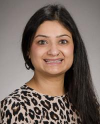 Headshot image of a smiling Dr. Namrata Singh